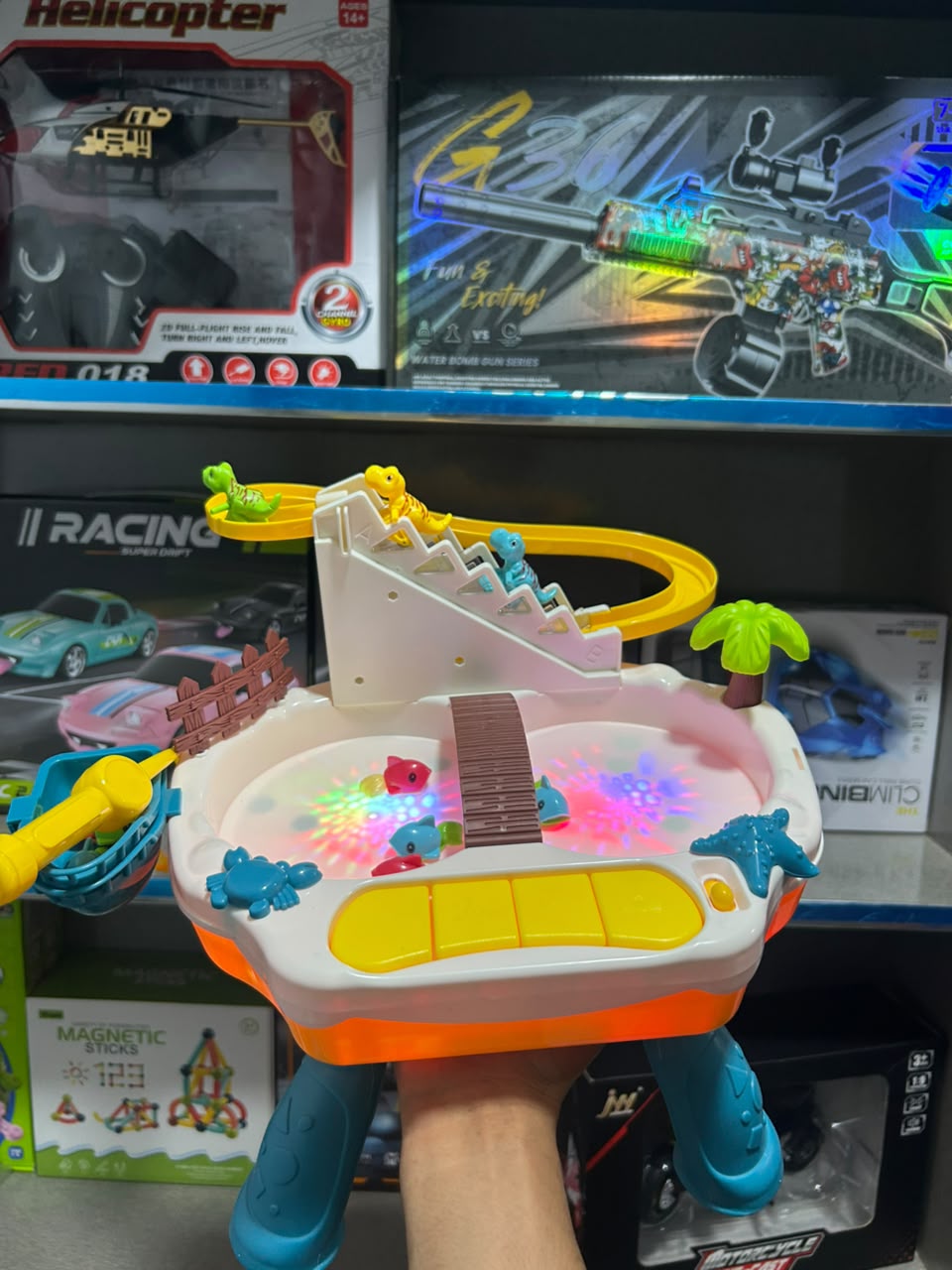 Dinosaur Slide Park Toy – Musical Track Playset with LED Lights & Floating Fish Pool