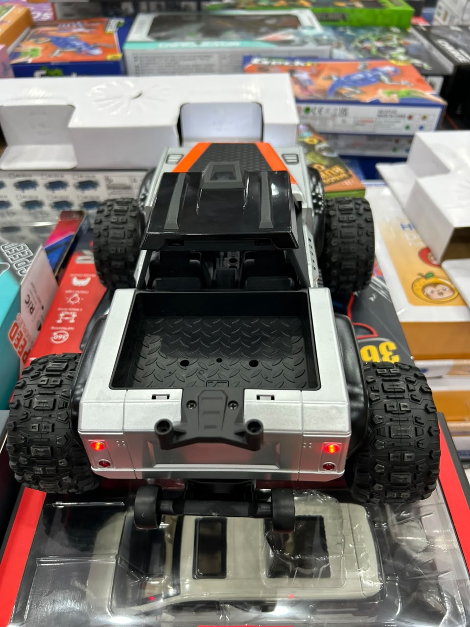 1:14 Hobby Grade RC Monster Truck 4x4 Off-Road Car – 40 km/hr High Speed, Nylon-Metal Body with LED Light Bar & Hydraulic Suspension