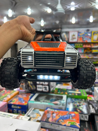 1:14 Hobby Grade RC Monster Truck 4x4 Off-Road Car – 40 km/hr High Speed, Nylon-Metal Body with LED Light Bar & Hydraulic Suspension