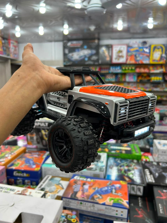 1:14 Hobby Grade RC Monster Truck 4x4 Off-Road Car – 40 km/hr High Speed, Nylon-Metal Body with LED Light Bar & Hydraulic Suspension