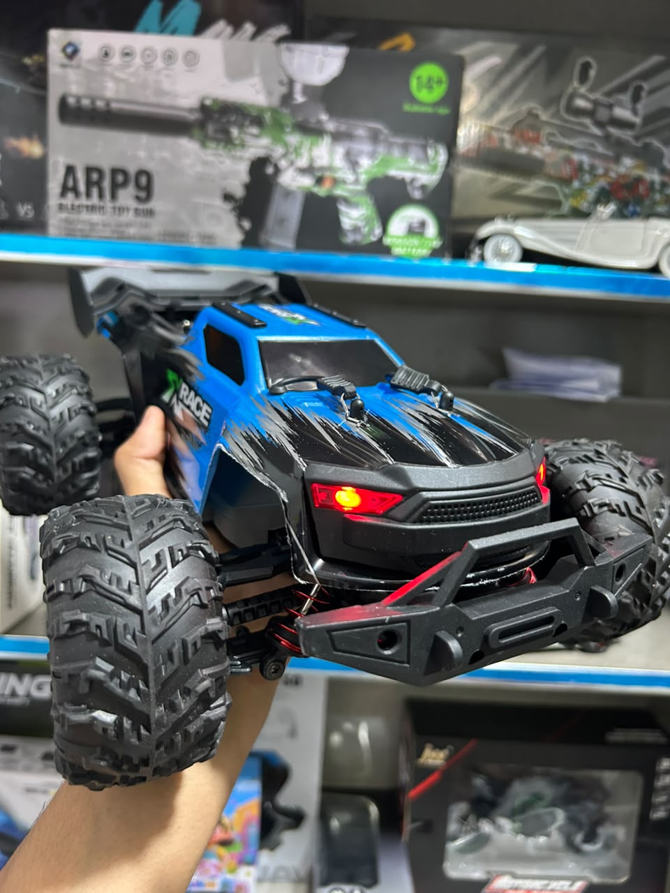 1:14 Hobby Grade RC Monster Truck 4x4 Off-Road Car – 50 km/hr High Speed with LED Lights & Hydraulic Suspension (Blue)