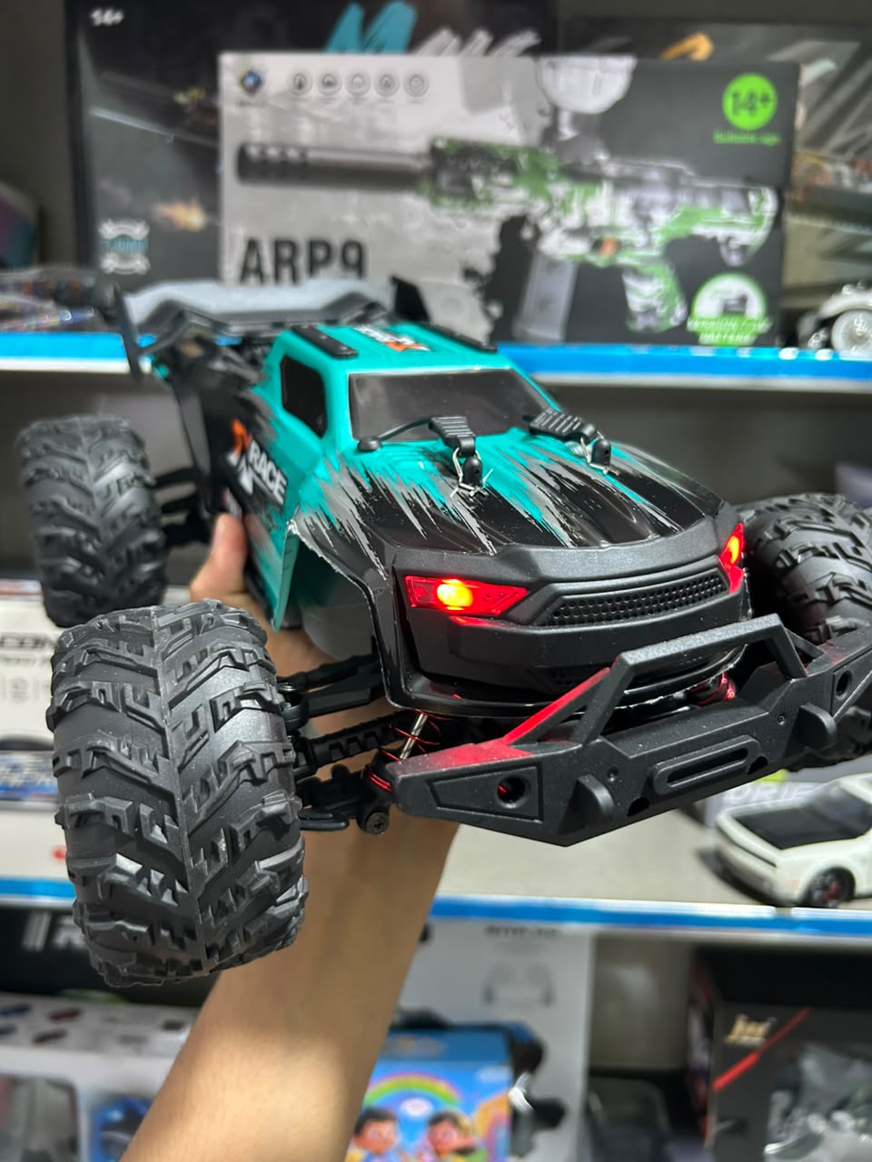 1:14 Hobby Grade RC Monster Truck 4x4 Off-Road Car – 50 km/hr High Speed with LED Lights & Hydraulic Suspension (Green)