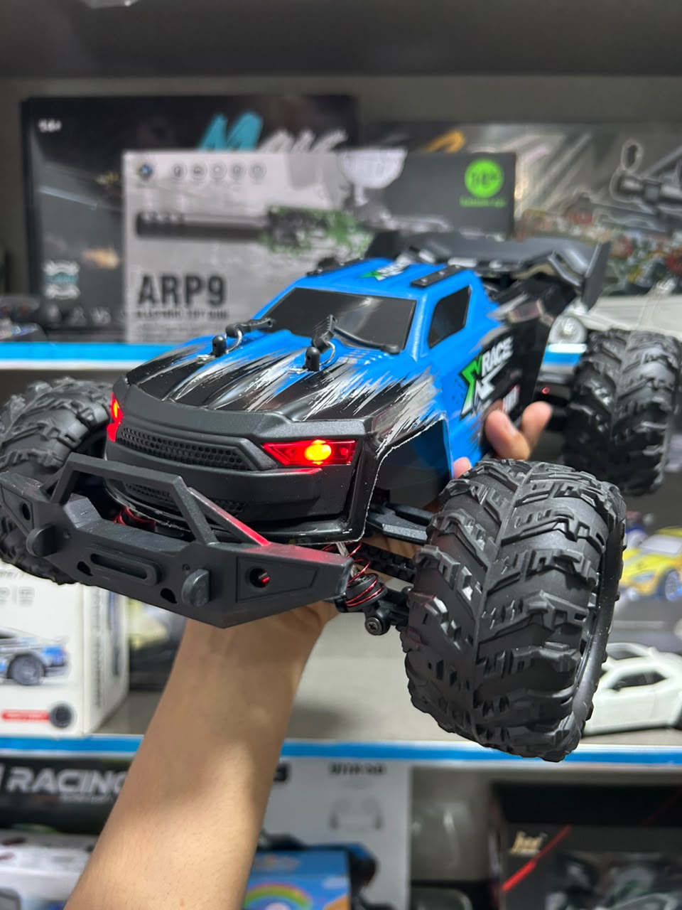 1:14 Hobby Grade RC Monster Truck 4x4 Off-Road Car – 50 km/hr High Speed with LED Lights & Hydraulic Suspension (Blue)