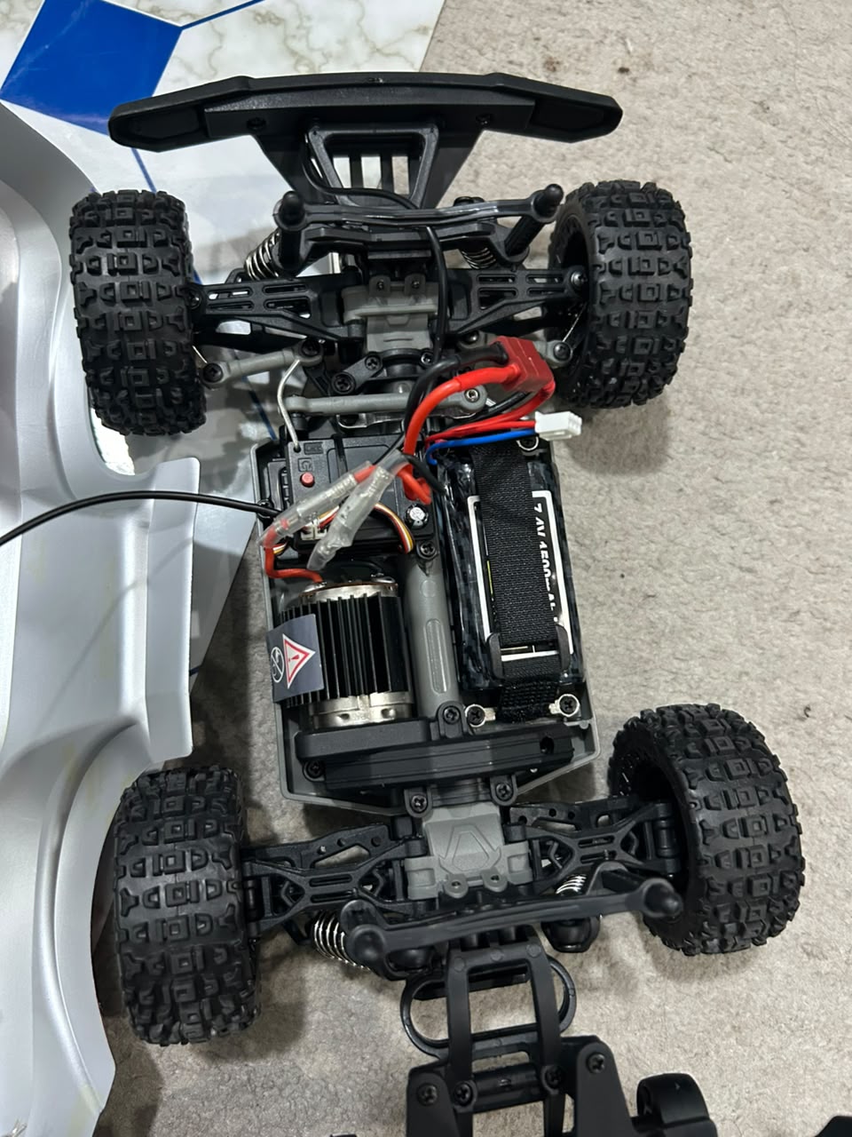 1:14 Hobby Grade RC Monster Truck 4x4 Off-Road Car – 50 km/hr High Speed with LED Lights & Hydraulic Suspension (Red)