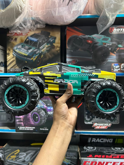 1:14 Hobby Grade RC Monster Truck 4x4 Off-Road Car – 50 km/hr High Speed with Alloy Chassis & Hydraulic Suspension Green